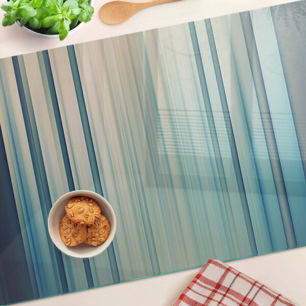 Glas Schneidebrett mit abstrakten Linien in Blautönen