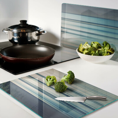 Glas Schneidebrett mit abstrakten Linien in Blautönen