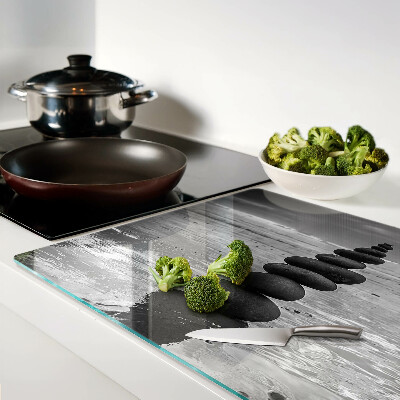 Glas Schneidebrett mit schwarzem und weißem Strandsteinmuster