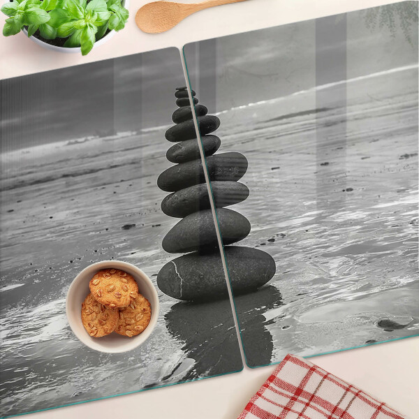 Glas Schneidebrett mit schwarzem und weißem Strandsteinmuster