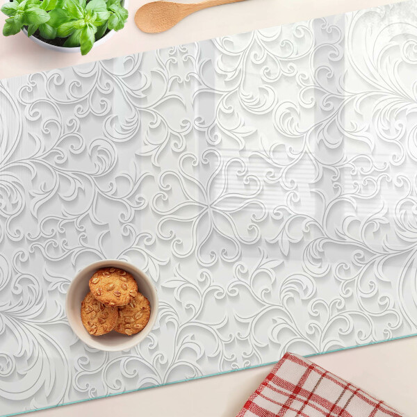 Schneidebrett Glas mit Blumenmuster und wellenförmiger Kante