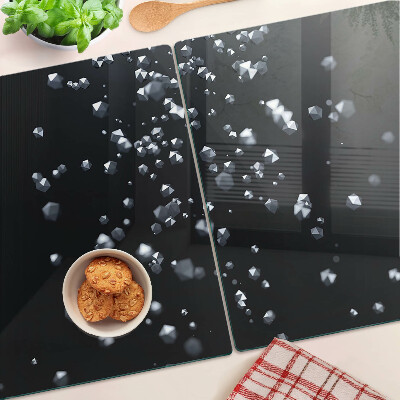 Schneidebrett mit Kristallblasen-Motiv auf schwarzem Hintergrund