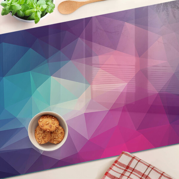 Schneidebrett mit geometrischem Muster in Rosa- und Blautönen