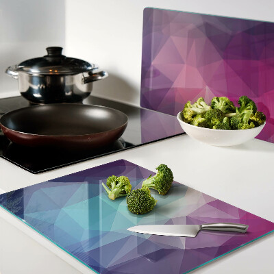 Schneidebrett mit geometrischem Muster in Rosa- und Blautönen