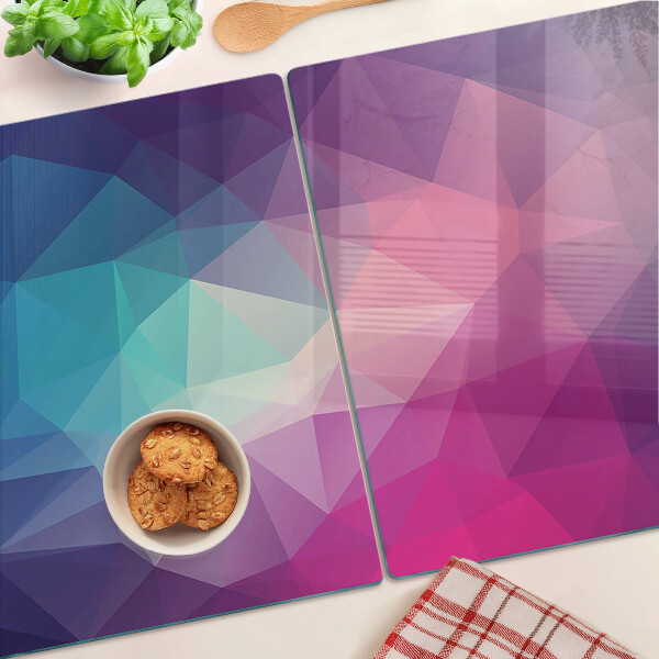 Schneidebrett mit geometrischem Muster in Rosa- und Blautönen
