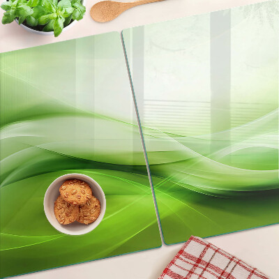 Glas-Schneidebrett mit grünen Wellen und dezenten Farbverläufen