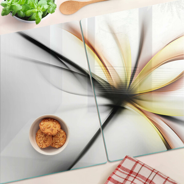 Schneidebrett mit floral-abstraktem Motiv und dynamischen Linien