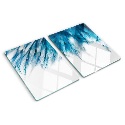 Schneidebrett glas Blaue Federn auf weißem Hintergrund