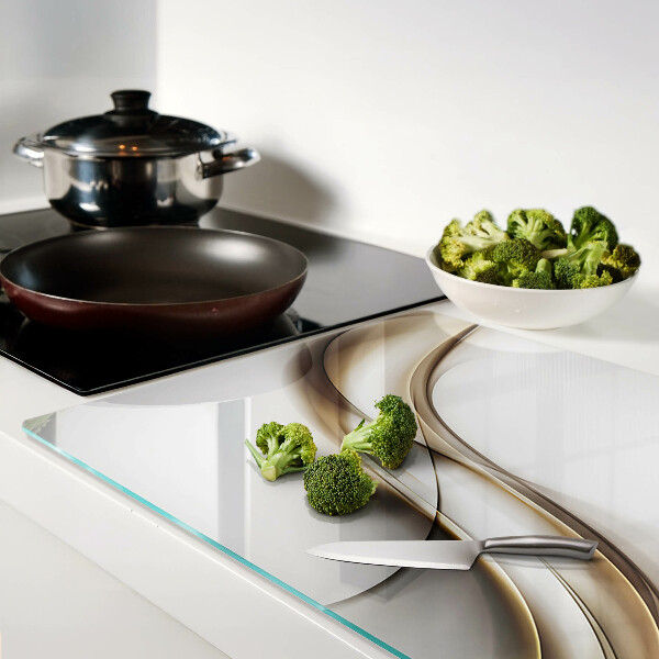 Schneidebrett mit wellenförmigem Muster in Beigetönen