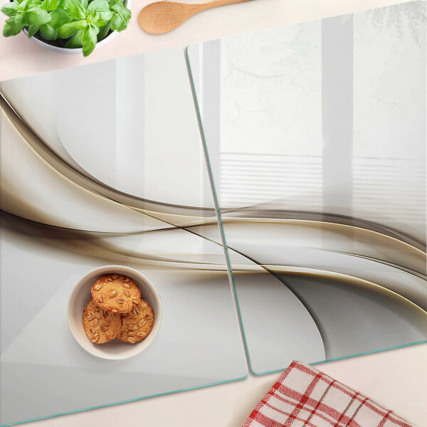 Schneidebrett mit wellenförmigem Muster in Beigetönen