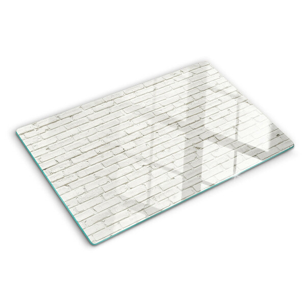 Schneidebrett Glas mit Motiv einer weißen Backsteinmauer