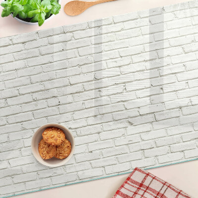 Schneidebrett glas Weiße Backsteinmauer