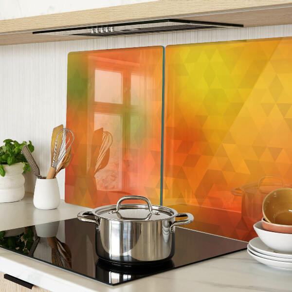 Glas-Schneidebrett mit geometrischem Muster in Orangetönen