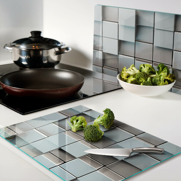 Schneidebrett mit Motiv aus geometrischen Fliesen in Blautönen