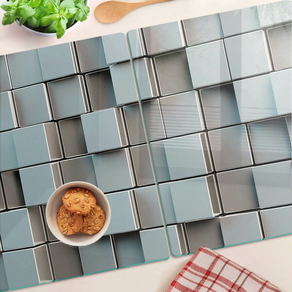 Schneidebrett mit Motiv aus geometrischen Fliesen in Blautönen