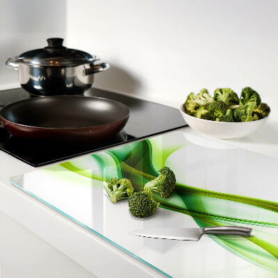 Glas-Schneidebrett mit wellenförmigem Muster in Grüntönen