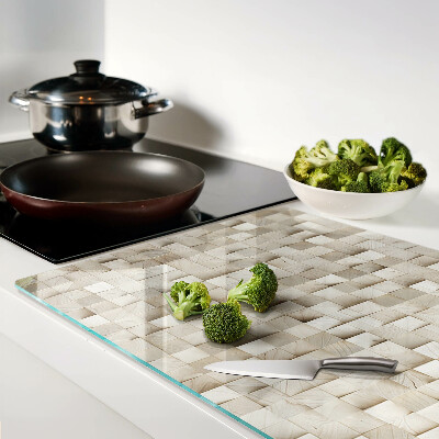 Schneidebrett mit Mosaikmotiv in neutralen Farbtönen