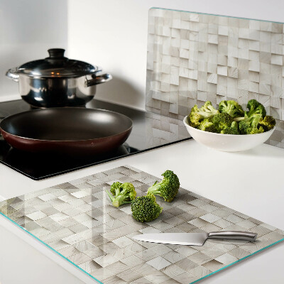 Schneidebrett mit Mosaikmotiv in neutralen Farbtönen