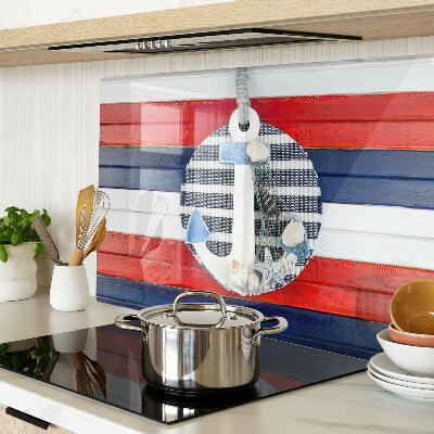 Glas schneidebrett Anker vor dem gestreiften Hintergrund