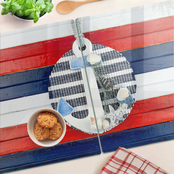 Glas schneidebrett Anker vor dem gestreiften Hintergrund