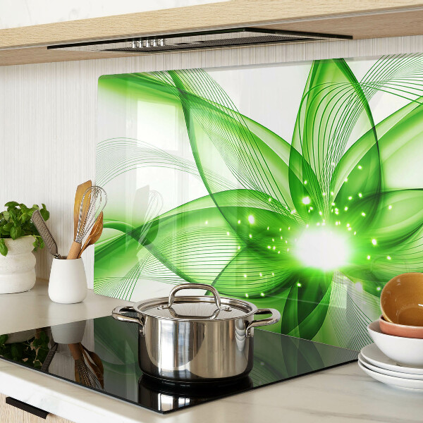 Glas-Schneidebrett mit grünem abstraktem Wellenmotiv