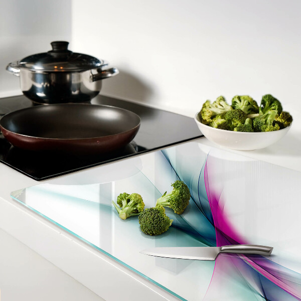 Schneidebrett mit abstraktem Farbwellen-Motiv