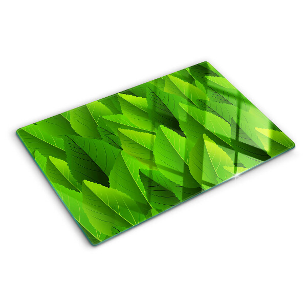 Schneidebrett Glas mit Blattmotiven in Grüntönen