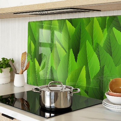 Schneidebrett Glas mit Blattmotiven in Grüntönen