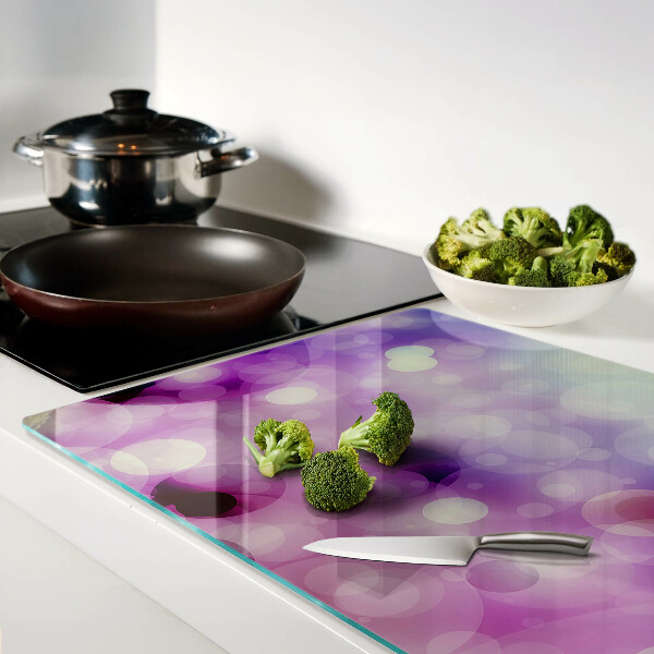 Glas schneidebrett Bokeh in Lila- und Rosatönen