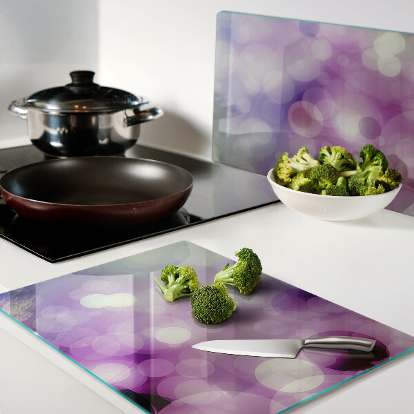 Glas schneidebrett Bokeh in Lila- und Rosatönen