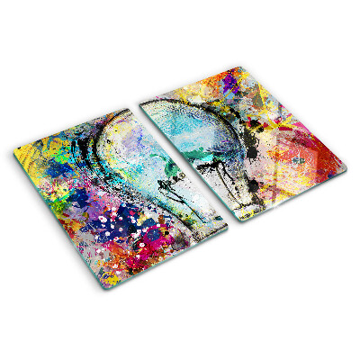 Schneidebrett mit Motiv einer Glühbirne auf farbigem Hintergrund