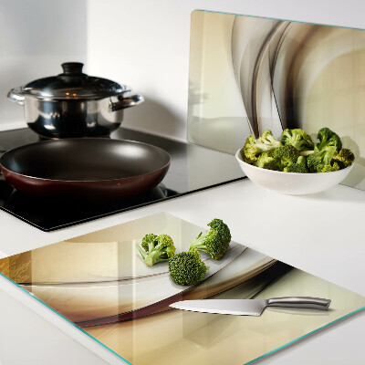 Schneidebrett Glas mit abstrakten Wellen in Beigetönen