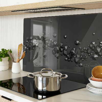 Schneidebrett Glas mit schwarzem Kristallmuster im Hintergrund