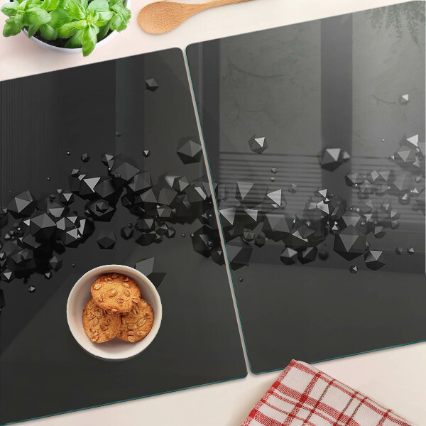 Schneidebrett Glas mit schwarzem Kristallmuster im Hintergrund