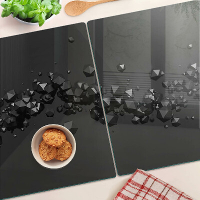 Schneidebrett glas Schwarze Kristalle im Hintergrund