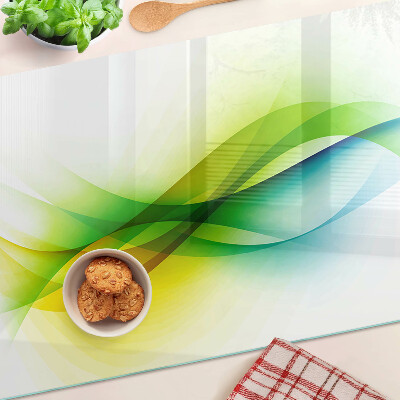 Schneidebrett Glas mit abstrakten Farbwellen