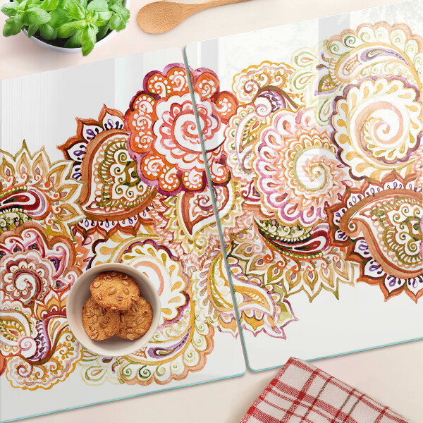 Glas-Schneidebrett mit Paisley-Muster in Rot- und Goldtönen
