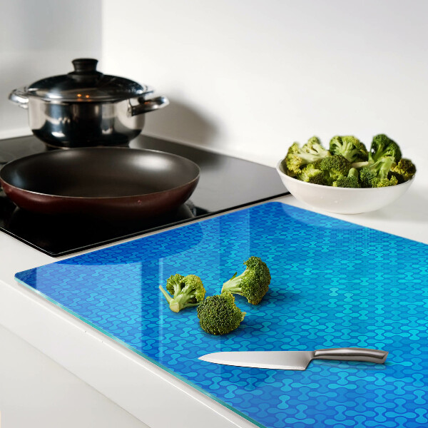 Glas schneidebrett Ein wellenförmiges Muster in Blautönen