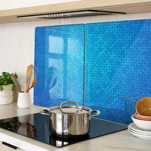 Glas schneidebrett mit wellenförmigem Muster in Blautönen