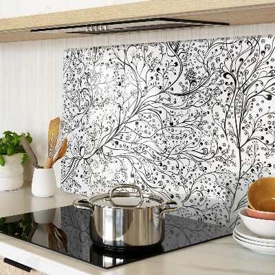 Glas Schneidebrett mit Pflanzenmuster und zarten Zweigen