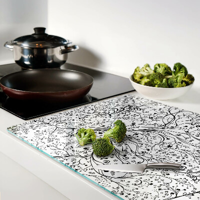 Glas schneidebrett Ein Pflanzenmuster mit zarten Zweigen