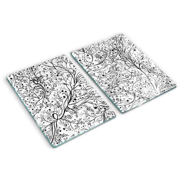 Glas Schneidebrett mit Pflanzenmuster und zarten Zweigen