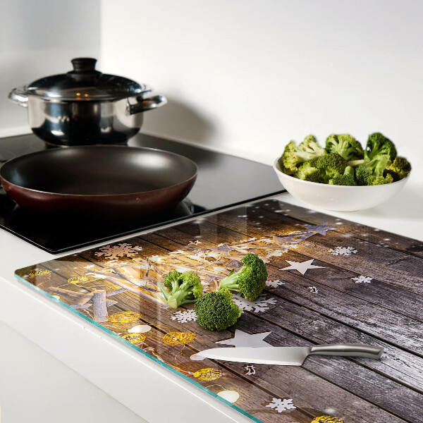 Glas-Schneidebrett mit Motiv eines geschmückten Weihnachtsbaums