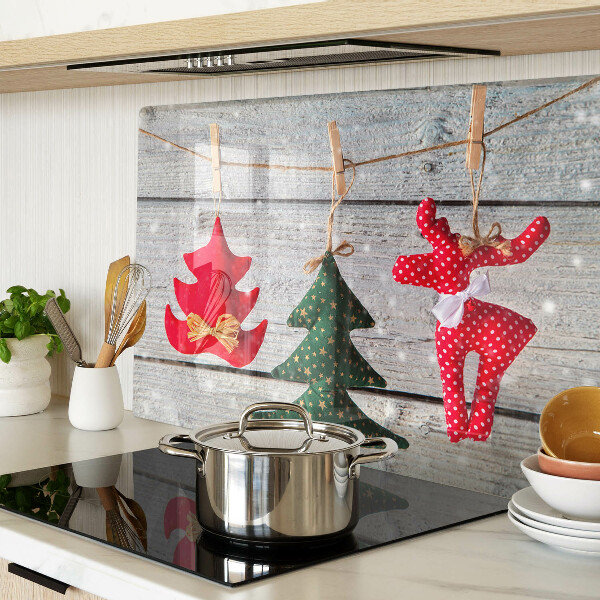 Schneidebrett mit Weihnachtsdekorationen auf Holzoptik