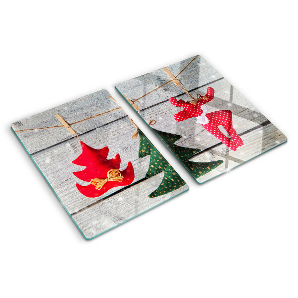 Schneidebrett mit Weihnachtsdekorationen auf Holzoptik