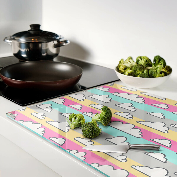 Schneidebrett Glas mit Wolkenmuster auf pastellfarbenem Hintergrund