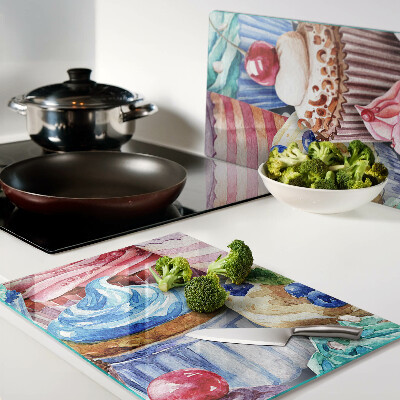 Schneidebrett mit Motiv aus Cupcakes und buntem Gebäck