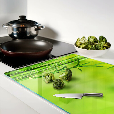 Schneidebrett Glas mit Bambusmotiv auf grünem Hintergrund