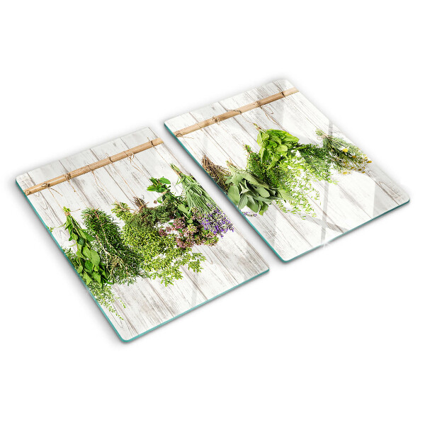 Glas schneidebrett Kräuter auf Holzgrund