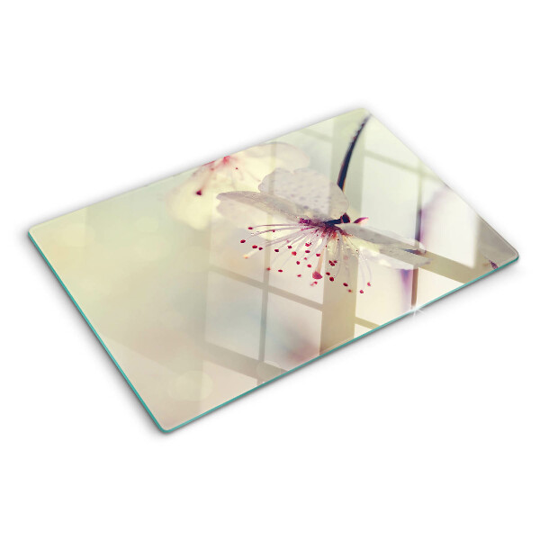 Schneidebrett Blumen auf geometrischem Hintergrund